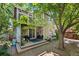 Charming home with a second story deck overlooking a stone patio and lush backyard at 8060 Meadowdale Sq, Niwot, CO 80503