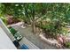 Backyard featuring a stone patio, privacy fence, and mature trees at 8060 Meadowdale Sq, Niwot, CO 80503