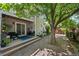 Cozy home with a deck and stone patio area in the backyard, great for outdoor living at 8060 Meadowdale Sq, Niwot, CO 80503