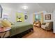 Relaxing bedroom with natural light, wood floors, and light yellow walls at 8060 Meadowdale Sq, Niwot, CO 80503