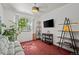 Bright bedroom with plush carpet, a window, and modern shelving at 8060 Meadowdale Sq, Niwot, CO 80503