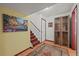 Cozy entryway with stairs, cabinets, and a rug at 8060 Meadowdale Sq, Niwot, CO 80503