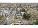 Charming home with manicured front yard, mature trees, and a well-maintained street at 2500 S Clayton St, Denver, CO 80210