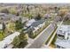Aerial view showcasing a residential neighborhood with tree-lined streets and well-kept homes at 2500 S Clayton St, Denver, CO 80210