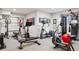 This home gym is fully equipped with weightlifting and cardio equipment, perfect for a full workout at 2500 S Clayton St, Denver, CO 80210