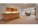 Finished basement with wet bar and pool table, providing a versatile recreation area at 101 Glenmoor Ln, Cherry Hills Village, CO 80113