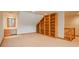 Spacious bonus room with built-in shelving and a desk area, perfect for an office or play area at 101 Glenmoor Ln, Cherry Hills Village, CO 80113