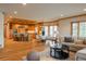 Expansive living space includes hardwood floors and a stylish kitchen with an island and open floor plan at 101 Glenmoor Ln, Cherry Hills Village, CO 80113