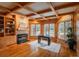 Elegant office with coffered ceiling, rich wood paneling, built-in shelving, and a fireplace at 101 Glenmoor Ln, Cherry Hills Village, CO 80113