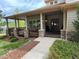 Inviting covered front porch with stone accents and a charming entrance, showcasing curb appeal at 1366 Killington Ct, Evergreen, CO 80439