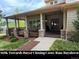 Inviting covered front porch with stone accents and ample space for relaxing at 1366 Killington Ct, Evergreen, CO 80439