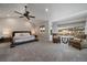 Large main bedroom features generous square footage, and great outdoor views at 1366 Killington Ct, Evergreen, CO 80439