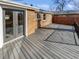 Spacious back deck features double doors to home and plenty of space for entertaining at 1479 S Bellaire St, Denver, CO 80222