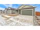 Charming single-Gathering home with a two-car garage and well-maintained front yard at 1595 Orchard St, Brighton, CO 80601