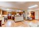 Open kitchen area with warm wood cabinets and stainless steel appliances at 20855 E Lyttle Dr, Parker, CO 80138