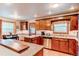 Charming kitchen with granite countertops, stainless steel appliances and wood cabinetry at 20855 E Lyttle Dr, Parker, CO 80138