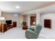 Cozy living room featuring plush carpeting, comfortable seating, and warm, neutral paint tones at 20855 E Lyttle Dr, Parker, CO 80138