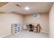 A simple and functional home office space with neutral walls, a small desk, and convenient storage solutions at 20855 E Lyttle Dr, Parker, CO 80138