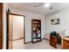 Home office with neutral walls, carpeted floor, wood trim, ceiling fan and a bookcase at 20855 E Lyttle Dr, Parker, CO 80138