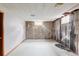 Unfinished basement with exposed framing, a window, and a blank canvas for future customization at 3520 Miller St, Wheat Ridge, CO 80033