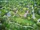 An aerial view of the property surrounded by trees at 5196 S Williams Dr, Greenwood Village, CO 80121