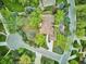 Aerial view of a home on a well-manicured, treed lot at 5196 S Williams Dr, Greenwood Village, CO 80121