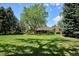 Beautiful landscaped lawn with mature trees at 5196 S Williams Dr, Greenwood Village, CO 80121