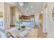 Bright dining area next to the kitchen featuring hardwood floors and modern lighting at 31101 Black Eagle Dr # 202, Evergreen, CO 80439