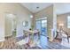 Inviting dining area with a patio door and modern decor at 31101 Black Eagle Dr # 202, Evergreen, CO 80439