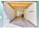 Spacious two car garage with ample storage, finished walls, and an automatic door at 31101 Black Eagle Dr # 202, Evergreen, CO 80439