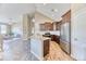 Stylish kitchen with stainless steel appliances, granite countertops, and ample cabinet space at 31101 Black Eagle Dr # 202, Evergreen, CO 80439