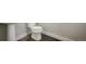 Bright and clean bathroom with hardwood floors and modern fixtures at 16069 E Elk Dr, Denver, CO 80239