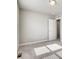 Bright, carpeted bedroom with a standard ceiling light fixture at 16069 E Elk Dr, Denver, CO 80239