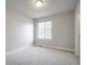 Spacious bedroom featuring plush carpeting and natural lighting from the window at 16069 E Elk Dr, Denver, CO 80239