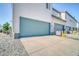 Attached garage with a large driveway and convenient access at 16069 E Elk Dr, Denver, CO 80239