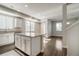 Bright and open kitchen with granite countertops, an island and stainless steel appliances at 16069 E Elk Dr, Denver, CO 80239