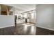 Open-concept living and kitchen space with modern finishes and natural light, creating an inviting and functional area at 16069 E Elk Dr, Denver, CO 80239