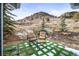 Patio featuring chairs and beautiful views of surrounding greenery at 31969 Robinson Hill Rd, Golden, CO 80403