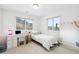Bright bedroom with a view, a bed, desk and dresser, offering a functional and peaceful place to rest at 31969 Robinson Hill Rd, Golden, CO 80403