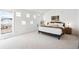 Bright, spacious bedroom features ample windows and neutral decor at 31969 Robinson Hill Rd, Golden, CO 80403