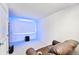 Versatile bonus room with a large screen, ambient lighting, and comfortable seating, perfect for entertainment at 31969 Robinson Hill Rd, Golden, CO 80403