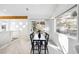 Dining area with large window offering a scenic view of the surrounding landscape at 31969 Robinson Hill Rd, Golden, CO 80403
