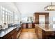 Gourmet kitchen features stainless appliances, granite counter tops, and bar seating at 31969 Robinson Hill Rd, Golden, CO 80403