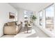 Bright living room with comfortable seating, large windows, and natural light at 31969 Robinson Hill Rd, Golden, CO 80403
