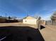 Backyard with dirt, other buildings, and a blue sky at 723 Newton St, Denver, CO 80204