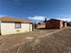 Exterior shot showing backyards of multiple properties under blue skies at 723 Newton St, Denver, CO 80204