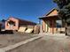 Exterior view of two homes with dirt yards, needing landscaping and improvements at 723 Newton St, Denver, CO 80204