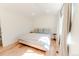 Comfortable bedroom with natural lighting, stylish furnishings, and hardwood floors at 4172 Deer Watch Dr, Castle Rock, CO 80104
