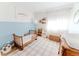 Bright bedroom features a toddler bed, toy storage, and ample natural light, creating a playful and inviting space at 4172 Deer Watch Dr, Castle Rock, CO 80104