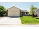 Lovely single-story home with attached two car garage and inviting, manicured front yard at 4172 Deer Watch Dr, Castle Rock, CO 80104